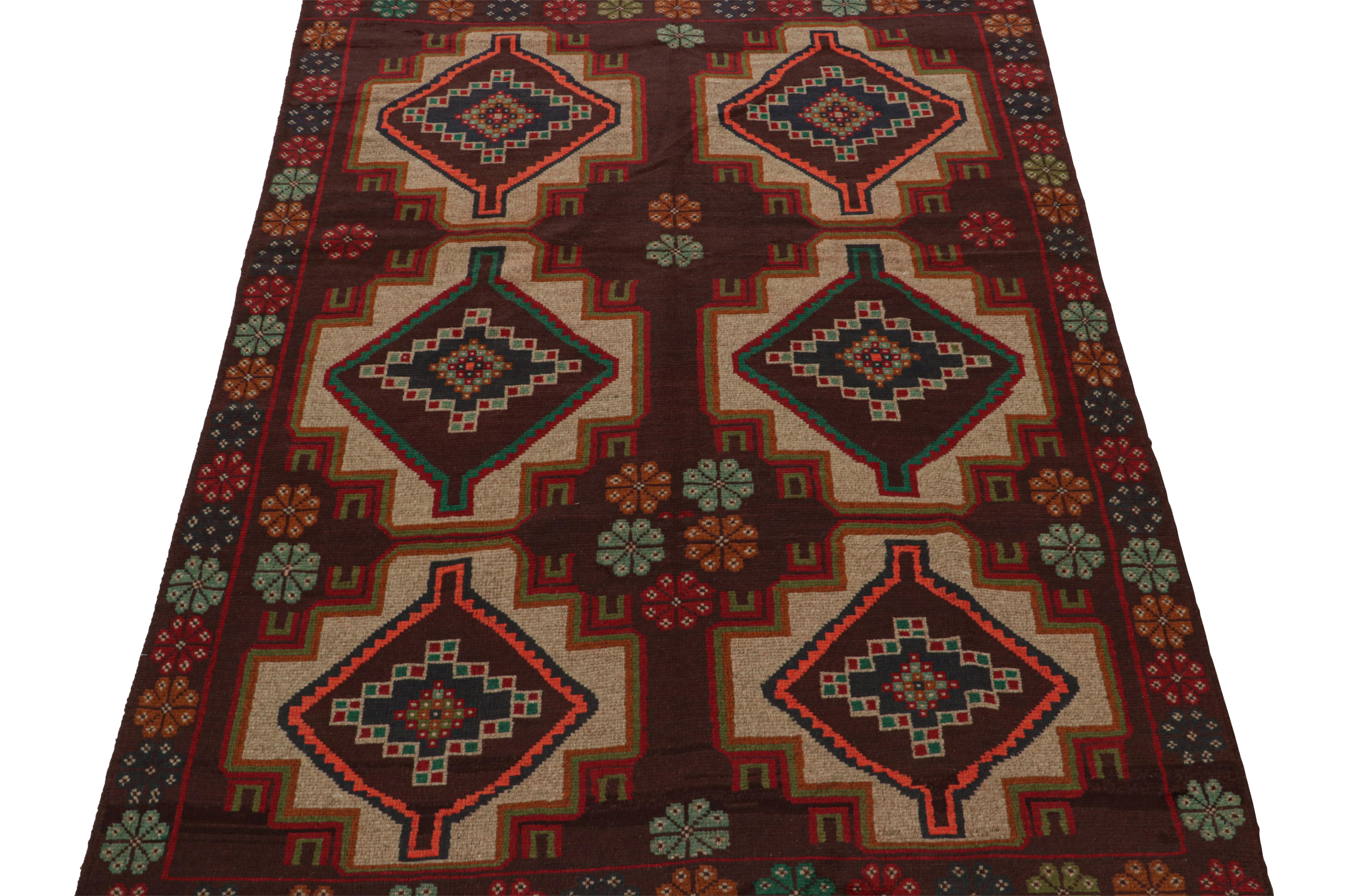 Hand-Knotted Rug & Kilim’s Afghan Baluch Tribal Rug in Rust Tones with Geometric Medallions For Sale