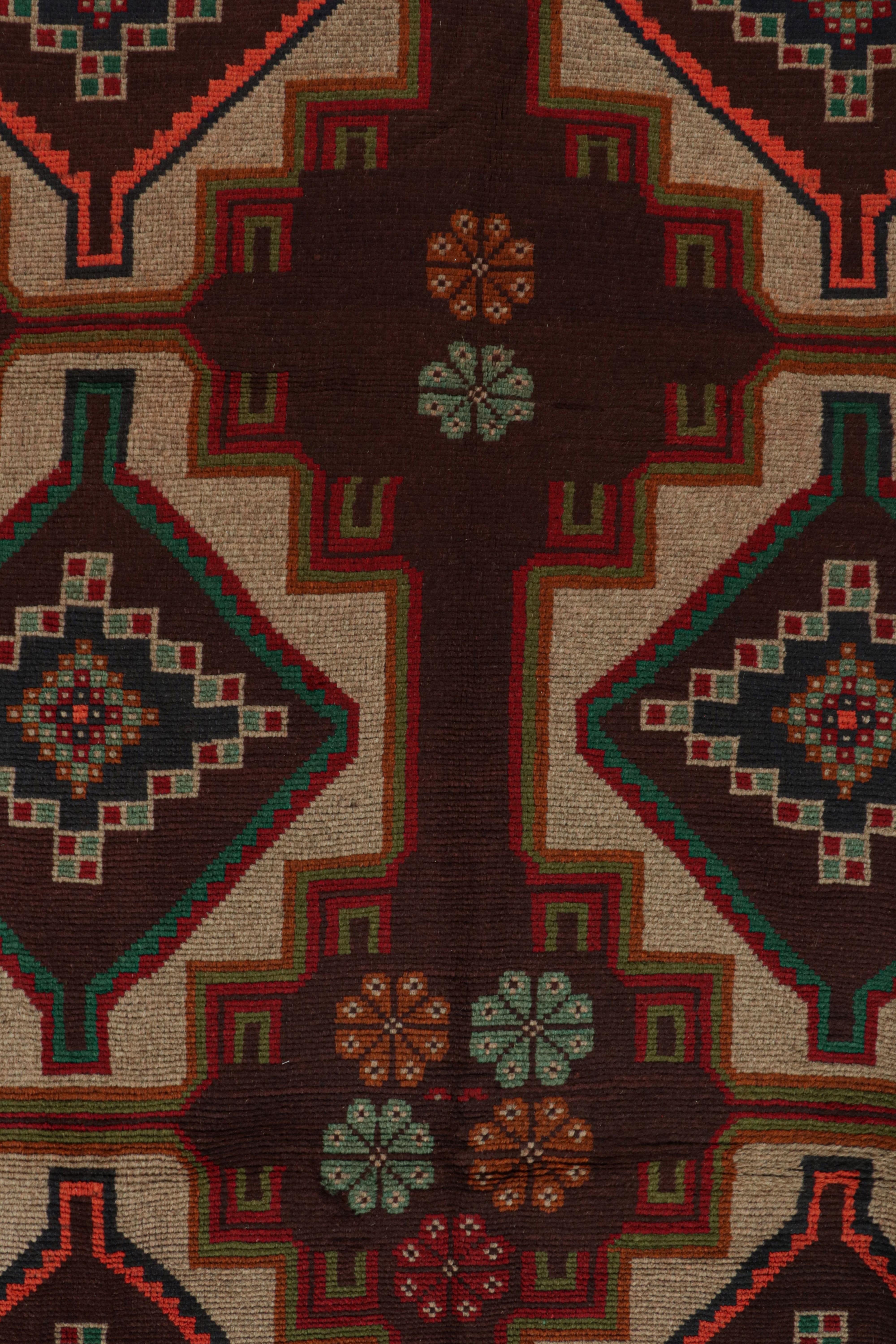 Wool Rug & Kilim’s Afghan Baluch Tribal Rug in Rust Tones with Geometric Medallions For Sale