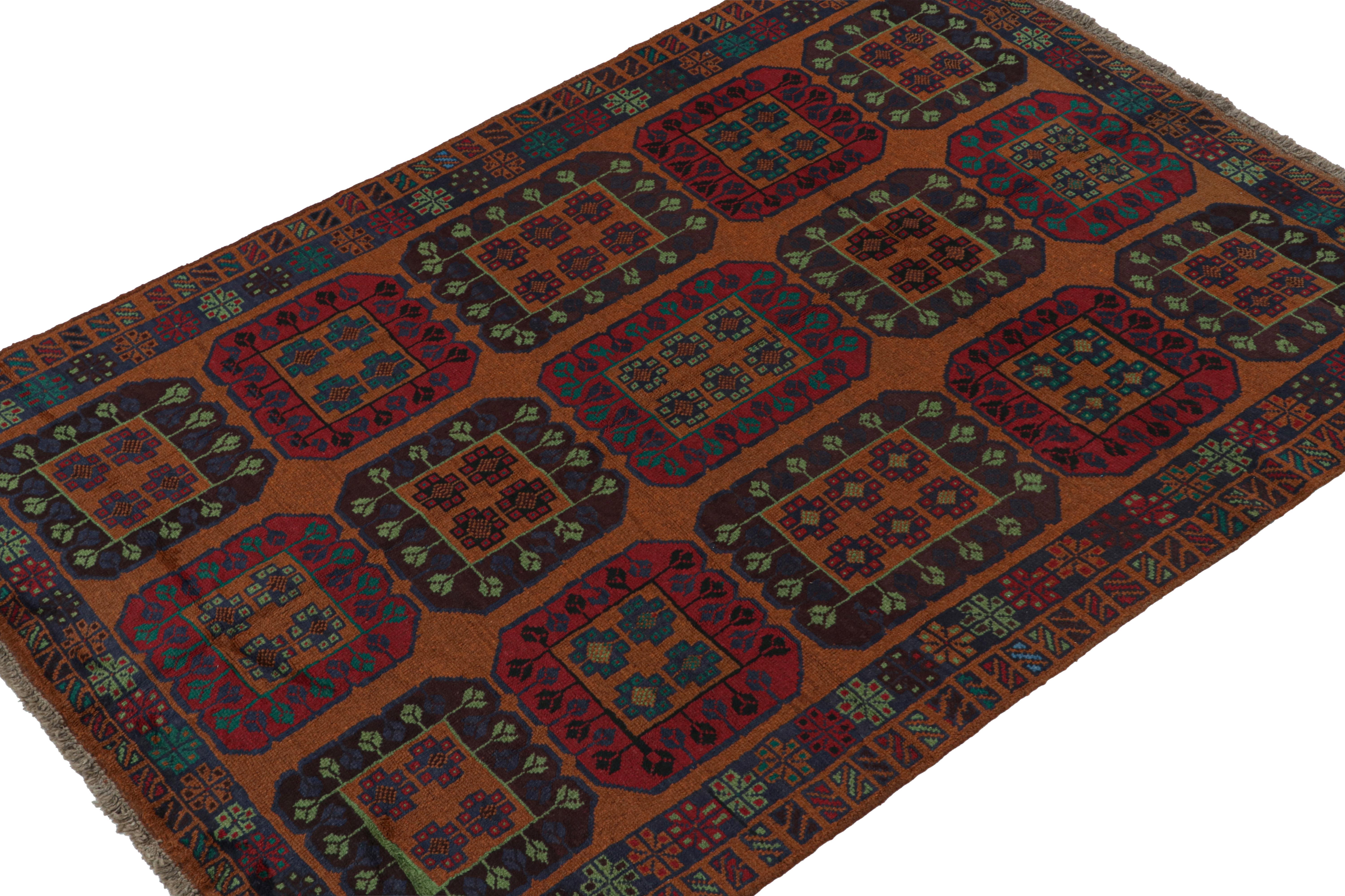 Hand knotted in wool, this 6x8 Baluch rug represents a new line of tribal carpets in the Modern Classics Collection by Rug & Kilim. Each piece  represents the work of women weavers in Afghanistan, preserving the rich tradition of their centuries-old