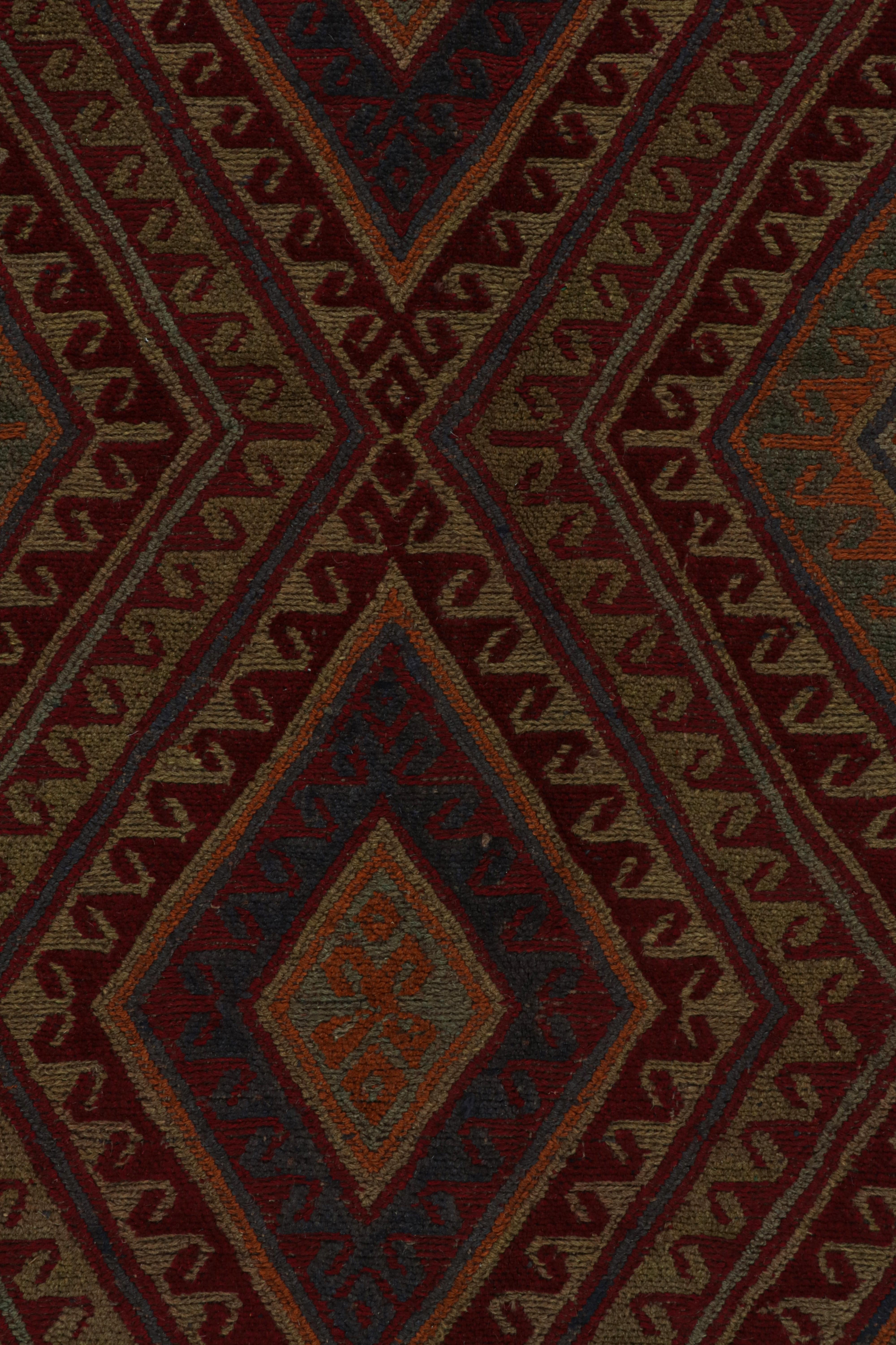 Laine Rug & Kilim's Afghan Baluch Tribal Rug with Colorful Geometric Patterns (tapis tribal afghan baloutche à motifs géométriques colorés) en vente