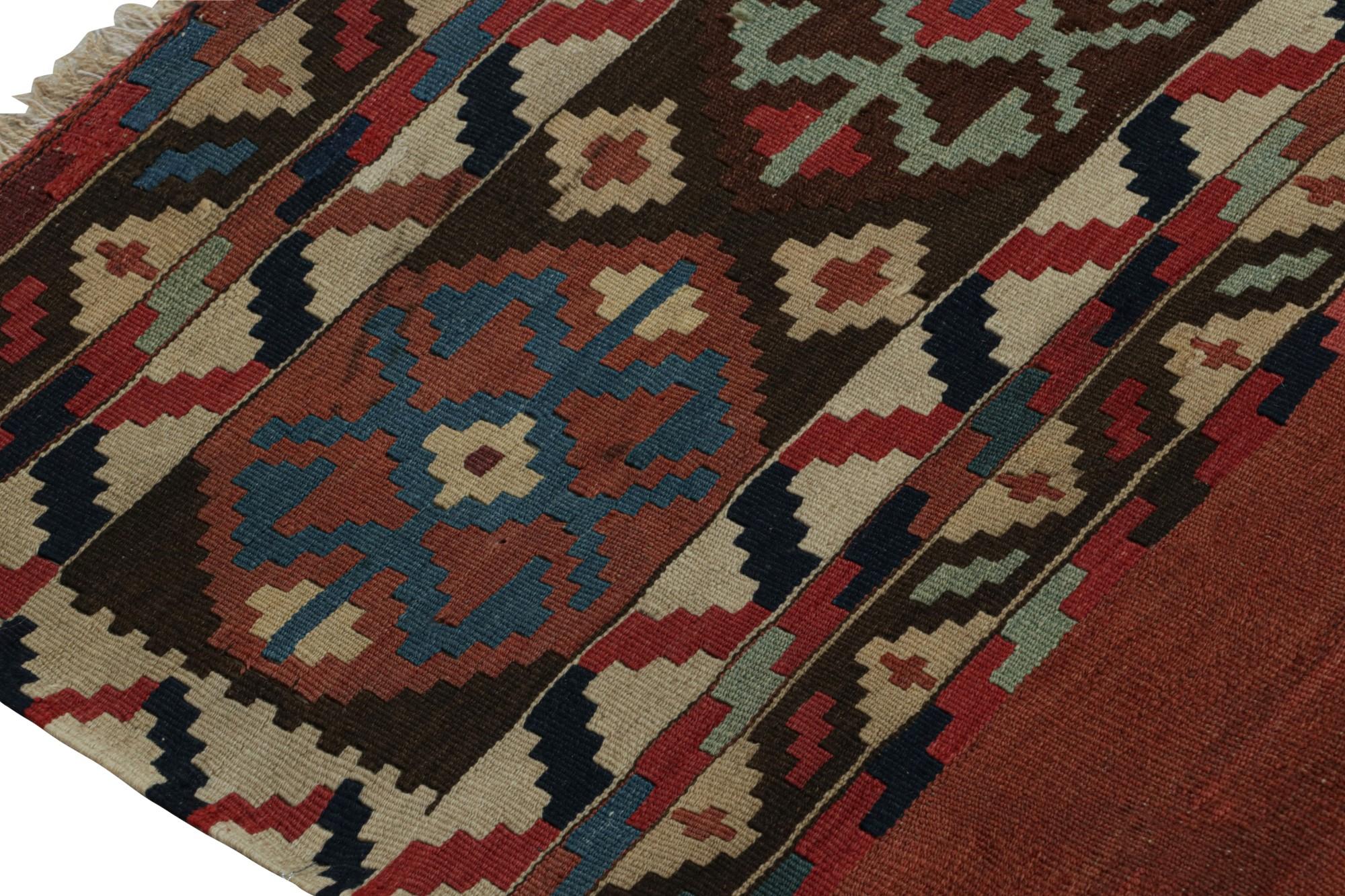 Noué à la main Rug & Kilim's Afghan Tribal Kilim Rug en rouge, avec motifs géométriques colorés en vente