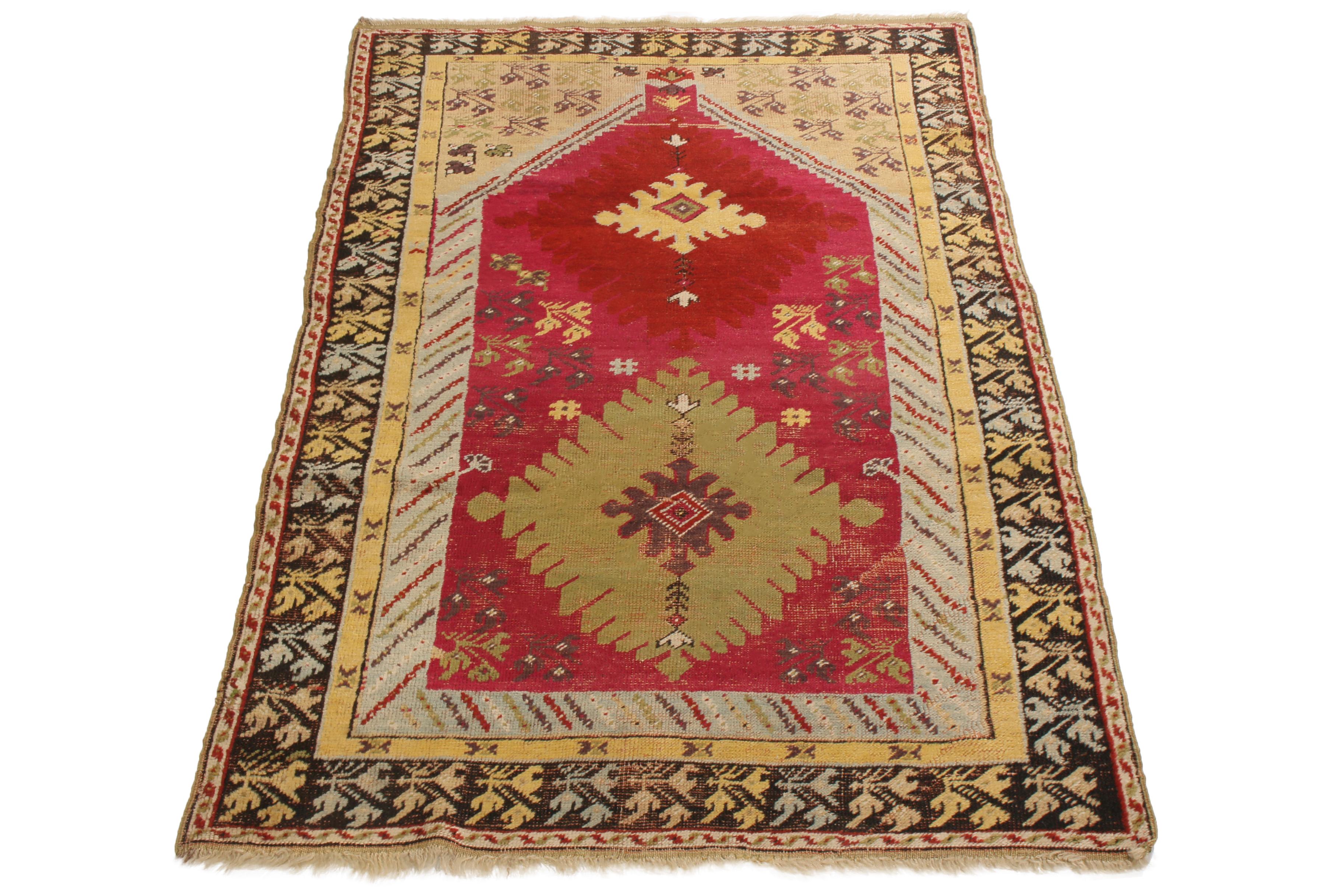 Originating from Turkey in 1890, this antique traditional Kirsehir rug emphasizes a distinguished combination of rejuvenated and protective symbols. Hand knotted in high-quality wool, at the center of the multi-tonal, textural red field Mihrab is an