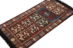 Rug & Kilim’s Antique Tribal Style rug in Red, Blue & Brown Patterns