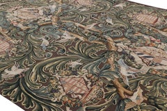 Rug & Kilim’s Armorial Tudor Style Rug in Black, with Beige, Blue and Gold Tones