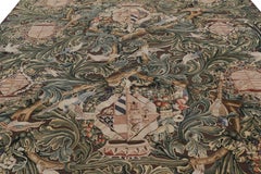 Rug & Kilim’s Armorial Tudor Style Rug in Black, with Beige, Blue and Gold Tones