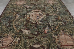 Rug & Kilim’s Armorial Tudor Style Rug in Black, with Beige, Blue and Gold Tones