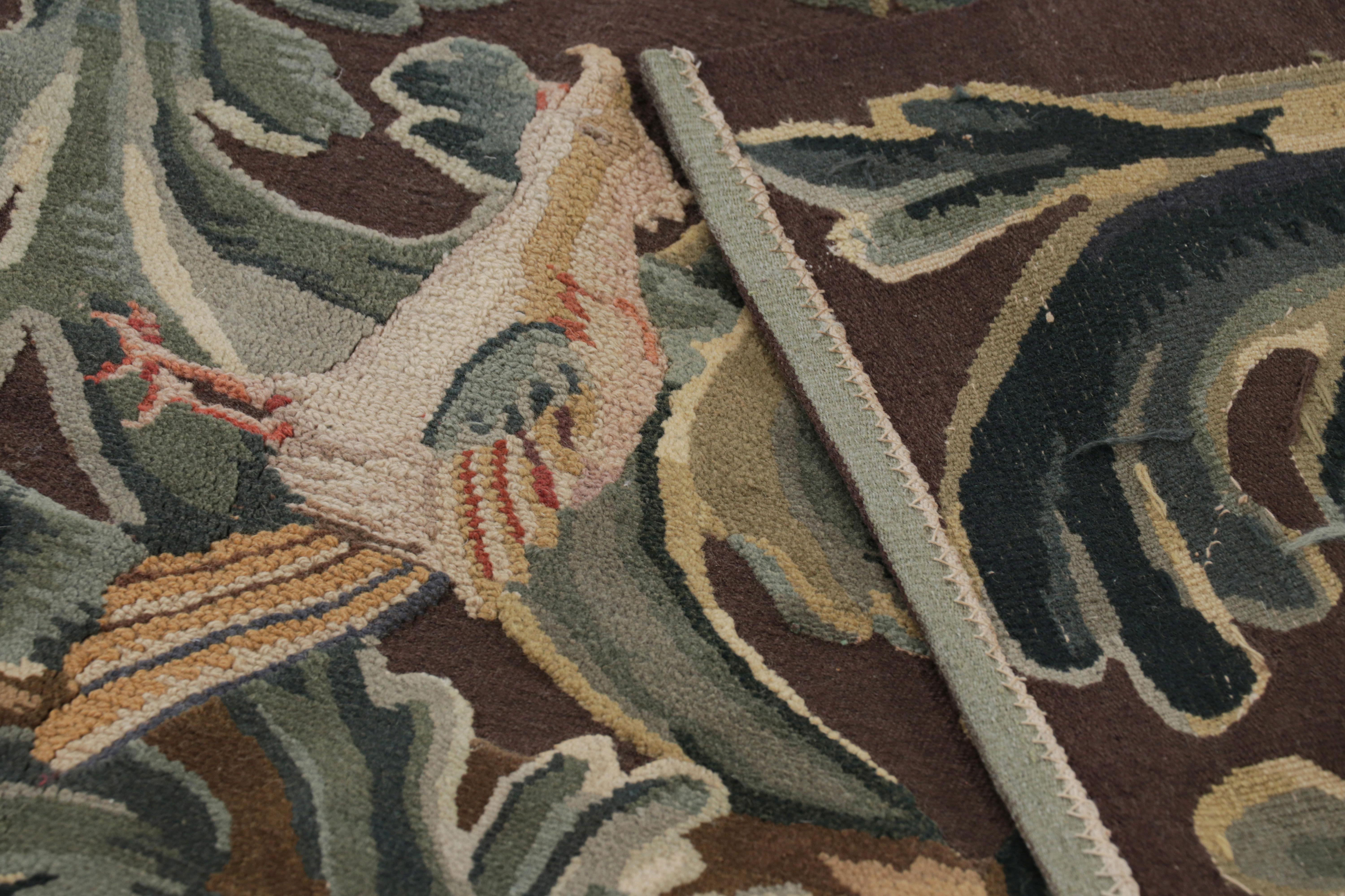Lana Rug & Kilim è un tappeto in stile Tudor in nero, con toni beige, blu e oro. in vendita