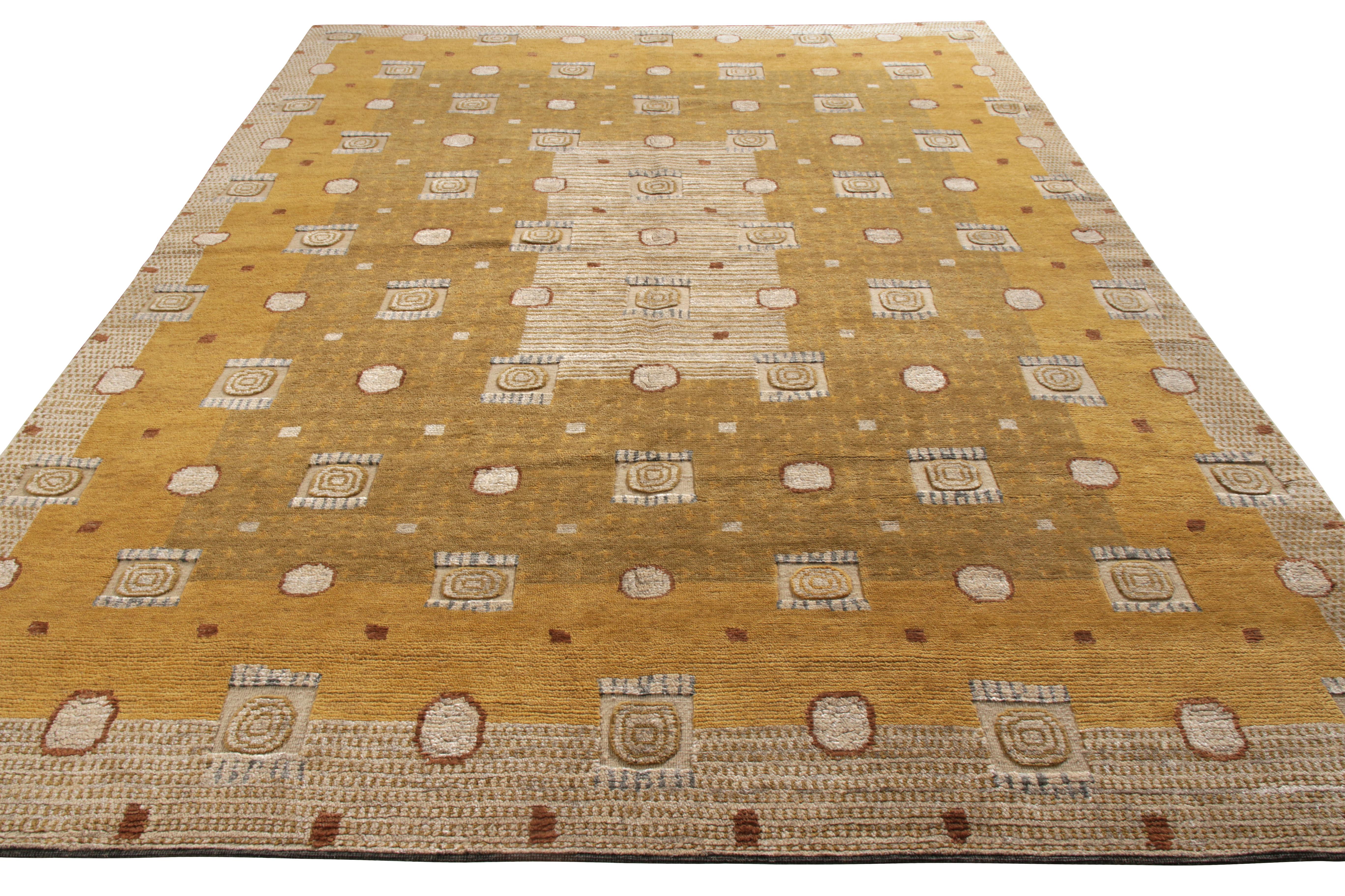 A 9x12 ode to celebrated Art Deco rug styles, from Rug & Kilim’s Deco Collection. Hand knotted in wool, marrying dynamic high-low pile textures with geometric patterns in gold and beige-brown hues. Crisp white accents bring out the graphic, depthful