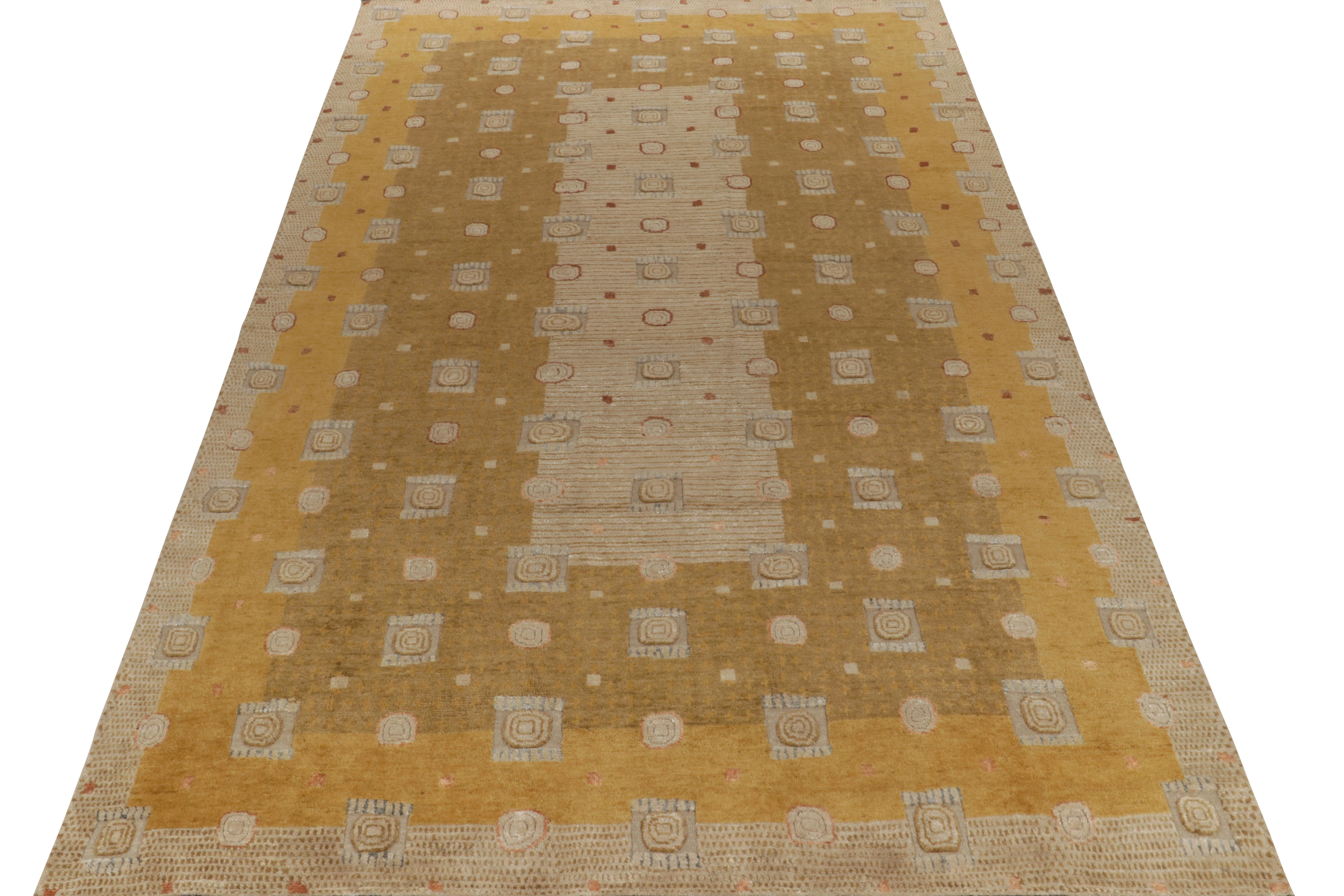 A 10x17 ode to celebrated Art Deco rug styles, from Rug & Kilim’s Deco Collection. Hand knotted in wool, marrying dynamic high-low pile textures with geometric patterns in gold and beige-brown hues. Crisp white accents bring out the graphic,