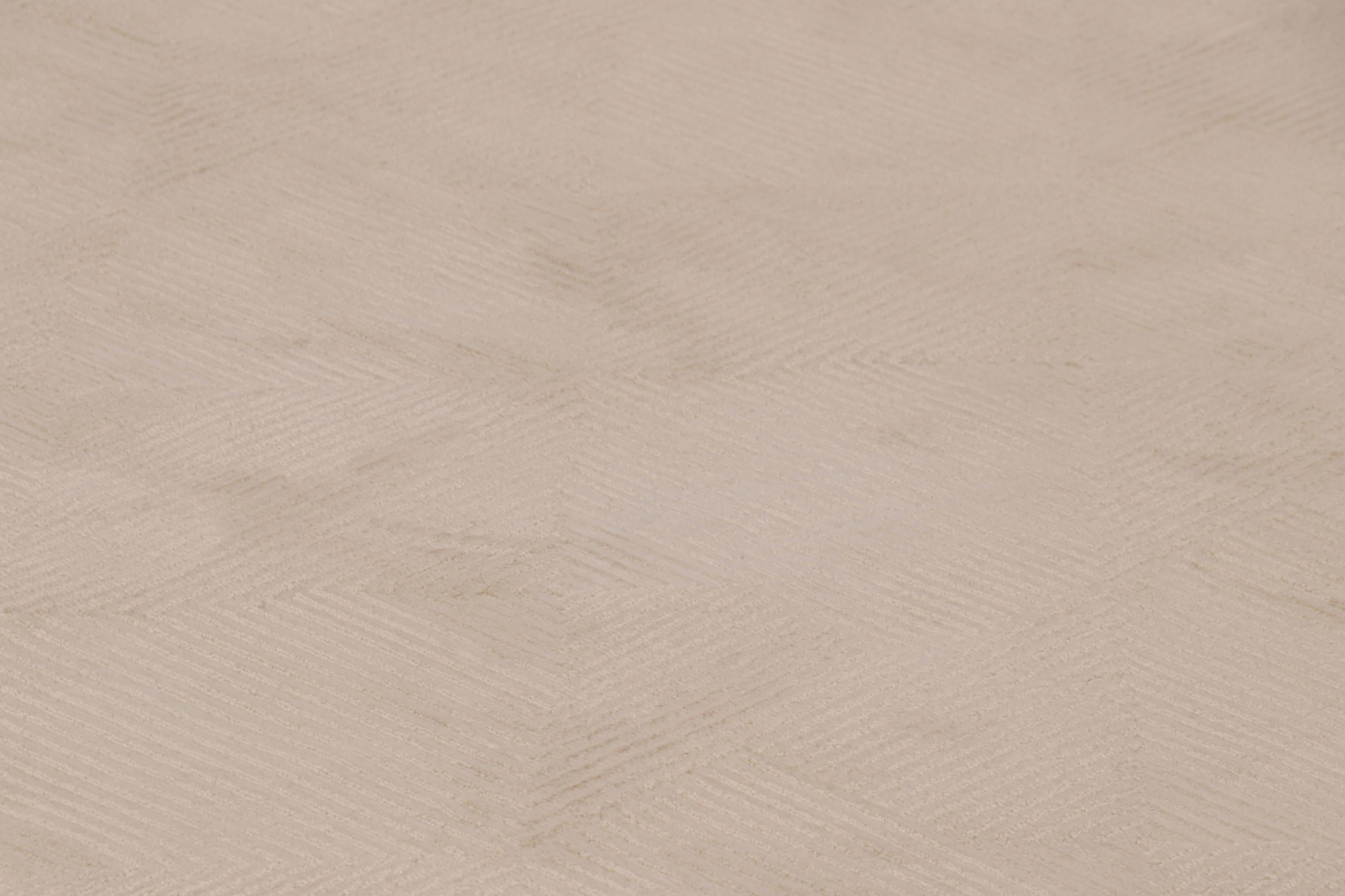 Hand-knotted in wool and silk, this 10x14 modern art deco rug is in one of our most luxurious modern constructions adapting 1920s cubist sensibilities 

On the Design: 

Connoisseurs may admire this piece with rippling geometric patterns in creamy