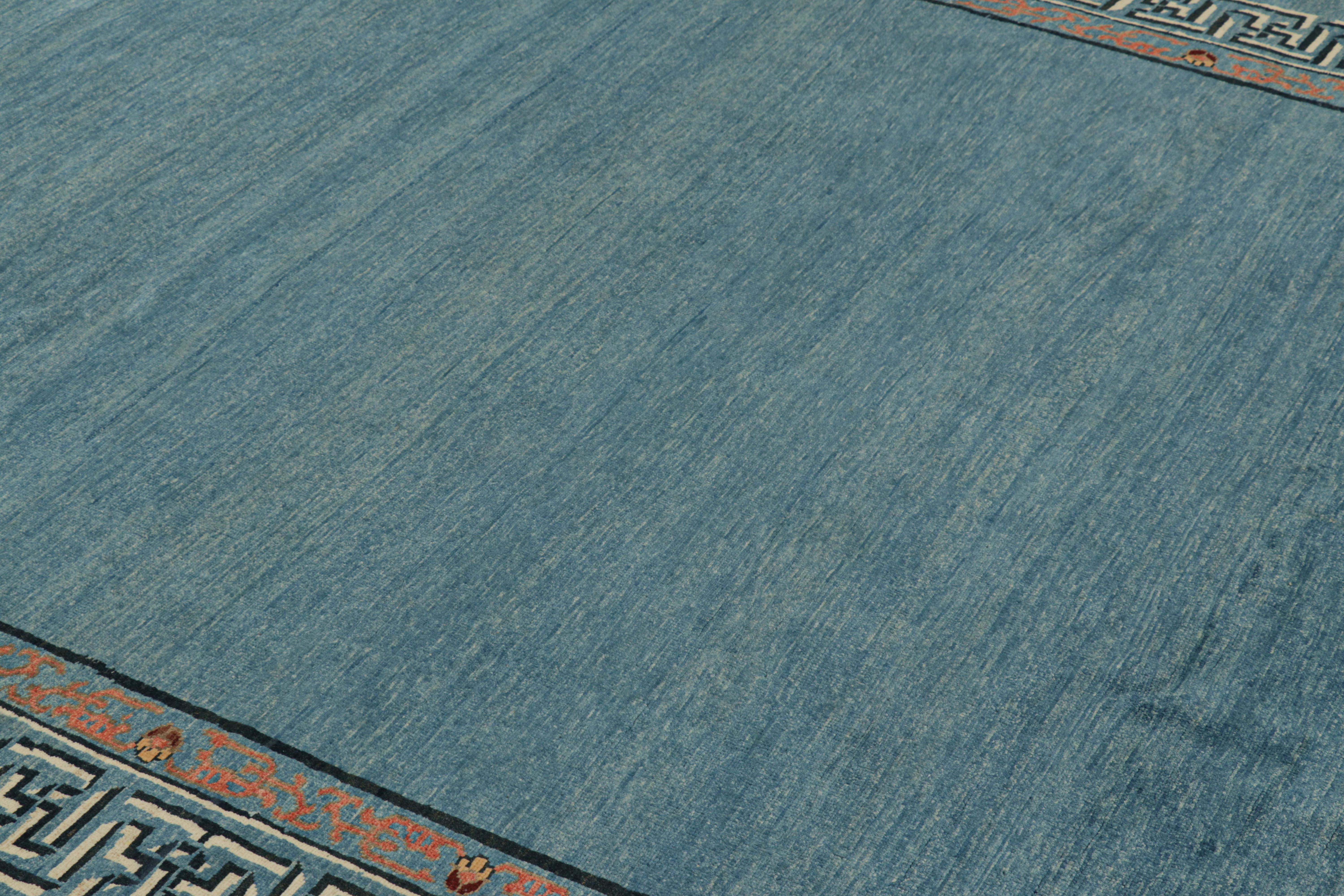 Hand-knotted in wool, this 6x10 Modern Classics rug by Rug & Kilim enjoys an open field design and geometric border inspired by the Chinese Art Deco movement of the 1920s. 

On the Design: 

Light blue tones underscore the open field, while a play