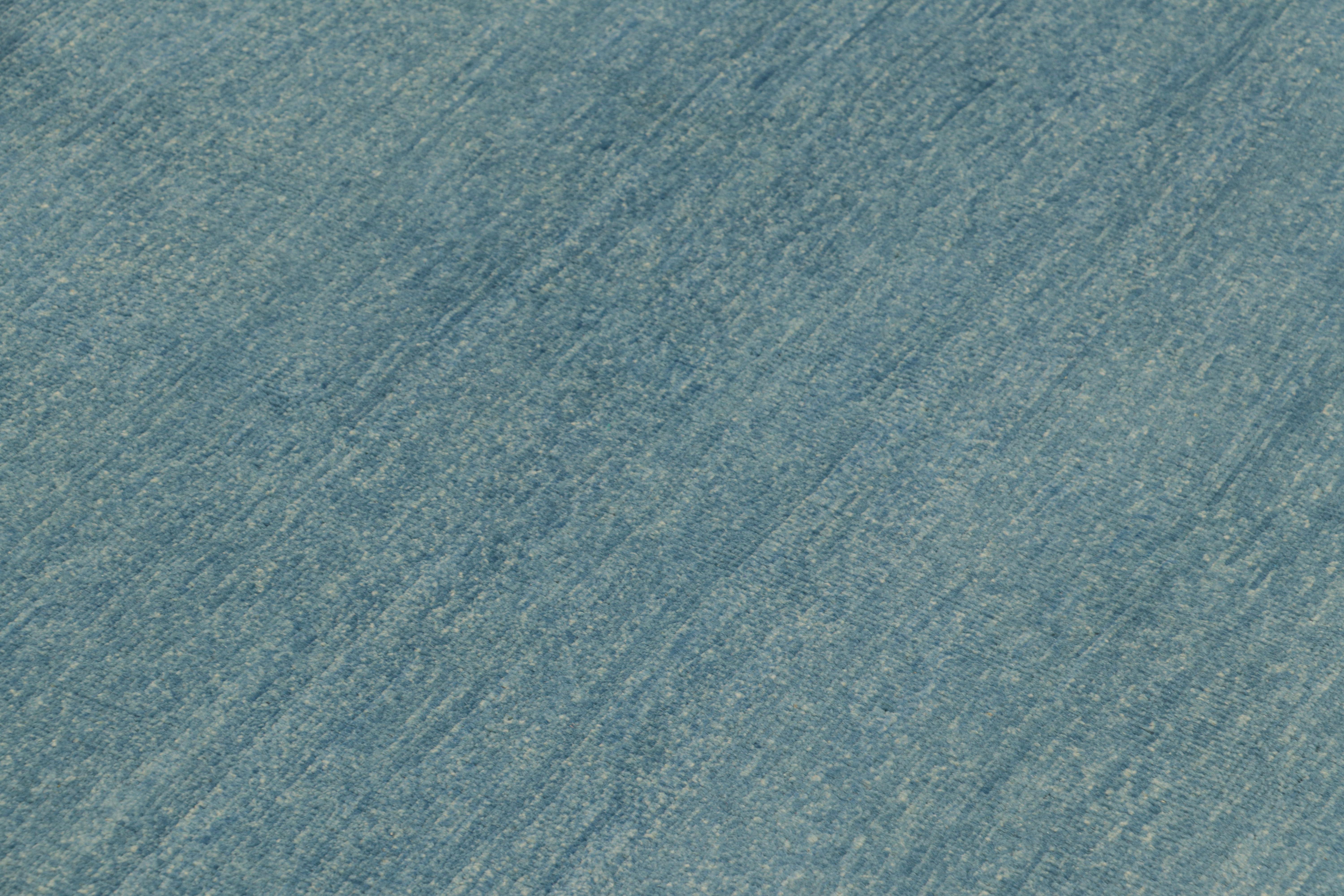 Hand-knotted in wool, this 8x9 Modern Classics rug by Rug & Kilim enjoys an open field design and geometric border inspired by the Chinese Art Deco movement of the 1920s. 

On the Design: 

Light blue tones underscore the open field, while a play of