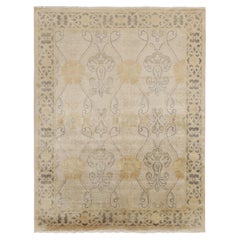 Tappeto Rug & Kilim in stile Art Nouveau di colore beige con motivi floreali a traliccio dorati
