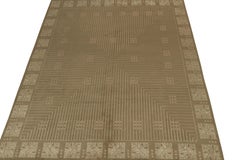 Rug & Kilim è un tappeto Art Deco in stile austriaco di colore marrone con motivo geometrico beige