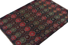 Rug & Kilim’s Baluch Tribal Rug in Brown with Colorful Hexagon Patterns