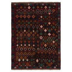 Rug & Kilim’s Baluch Tribal Rug in Burgundy with Colorful Diamond Patterns