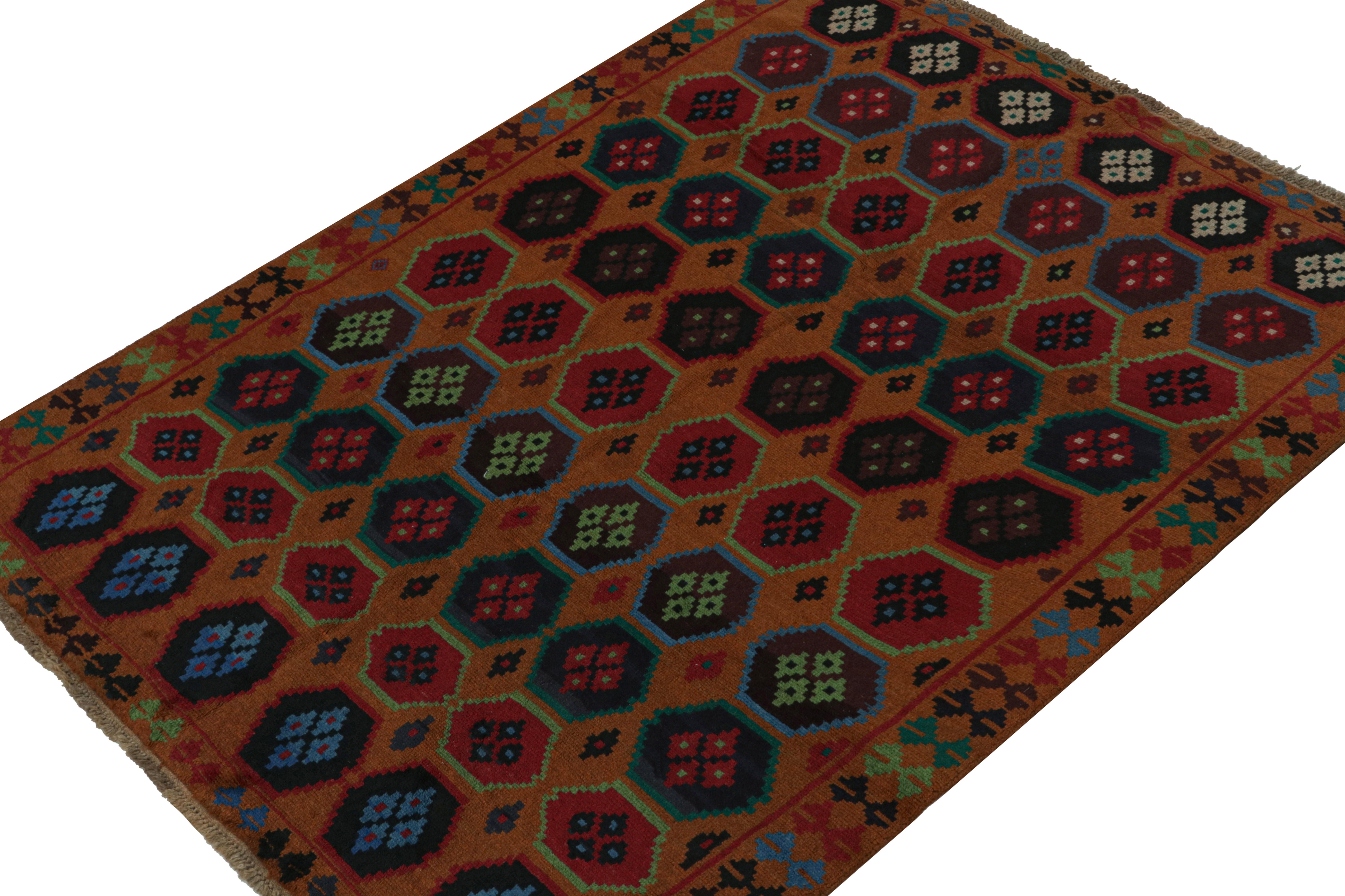 Hand knotted in wool, this 6x8 Baluch rug represents a new line of tribal carpets in the Modern Classics Collection by Rug & Kilim. Each piece  represents the work of women weavers in Afghanistan, preserving the rich tradition of their centuries-old