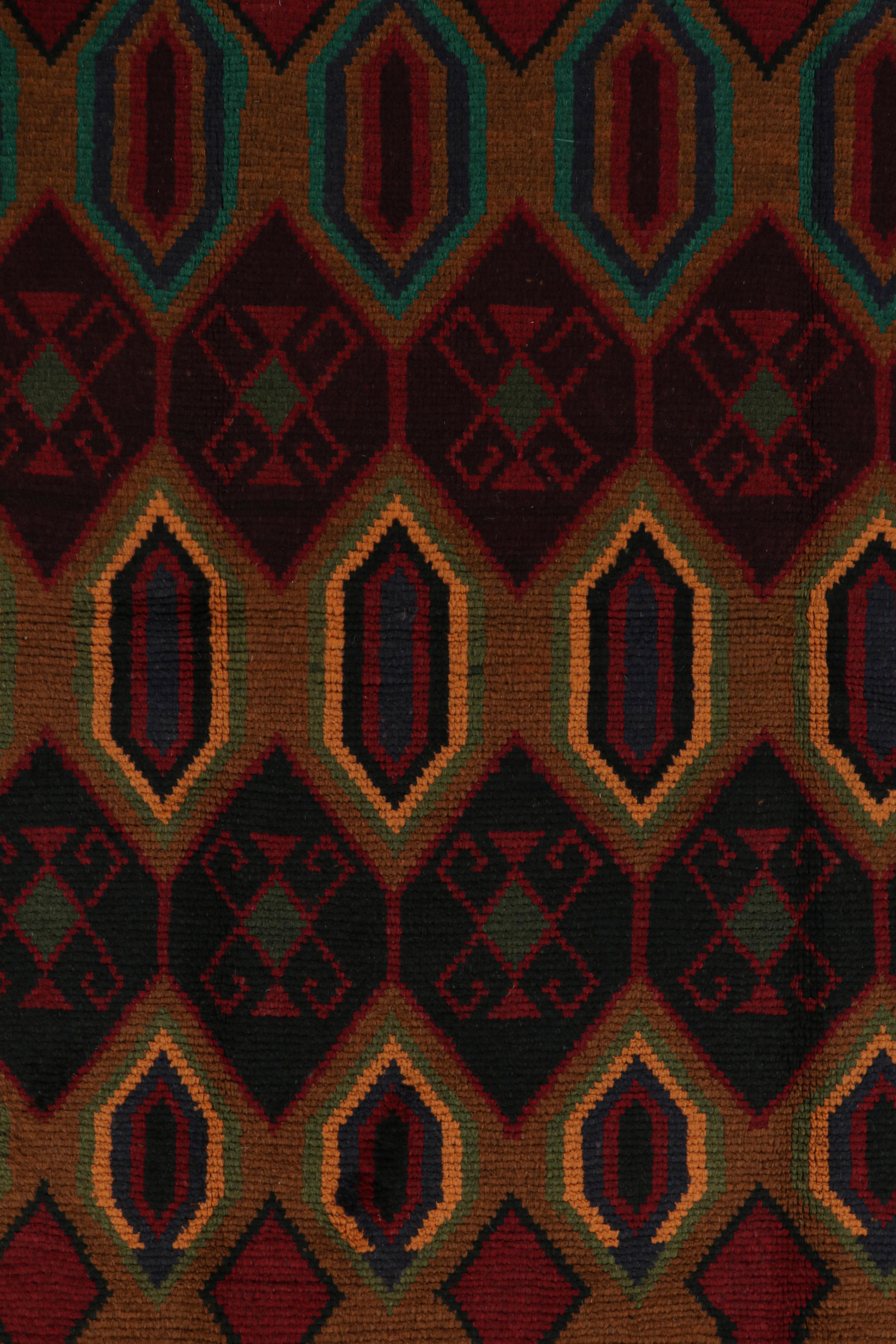 Contemporary Rug & Kilim’s Baluch Tribal Rug in Rust Tones with Colorful Hexagon Patterns For Sale
