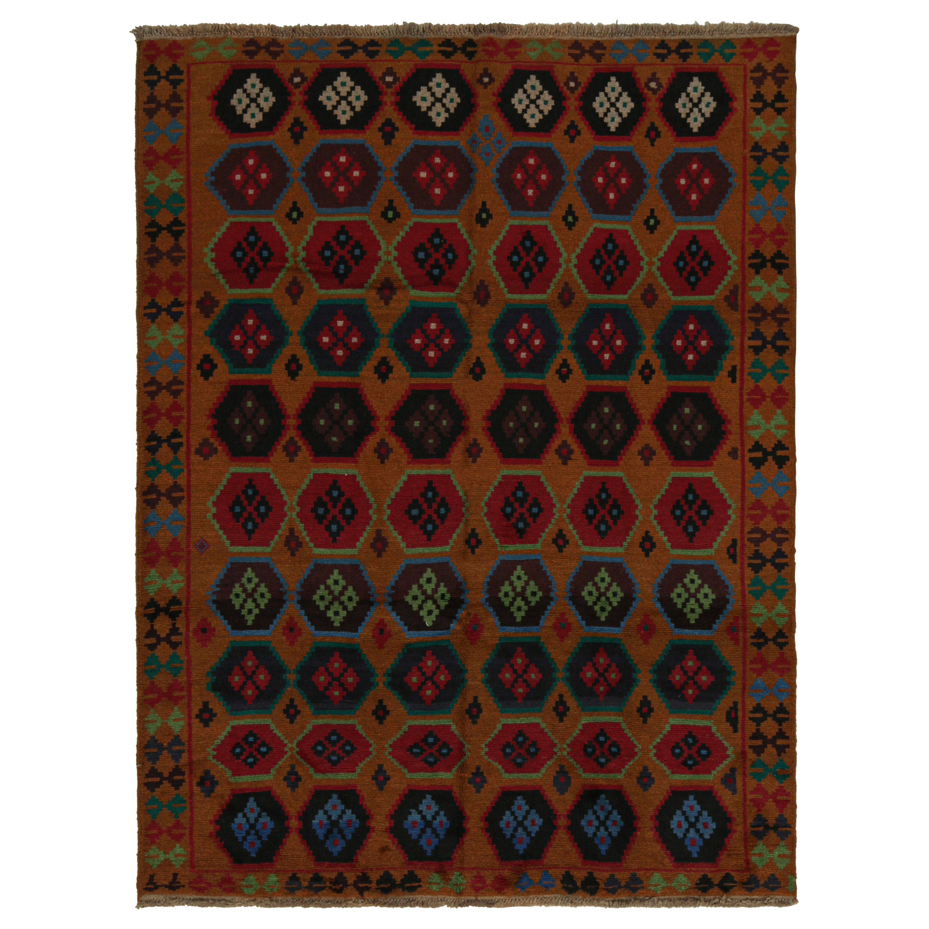 Rug & Kilim’s Baluch Tribal Rug in Rust Tones with Colorful Hexagon Patterns For Sale