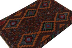 Rug & Kilim’s Baluch Tribal Rug with Colorful Geometric Patterns