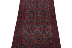Rug & Kilim’s Baluch Tribal Rug with Burgundy and Navy Blue Geometric Patterns