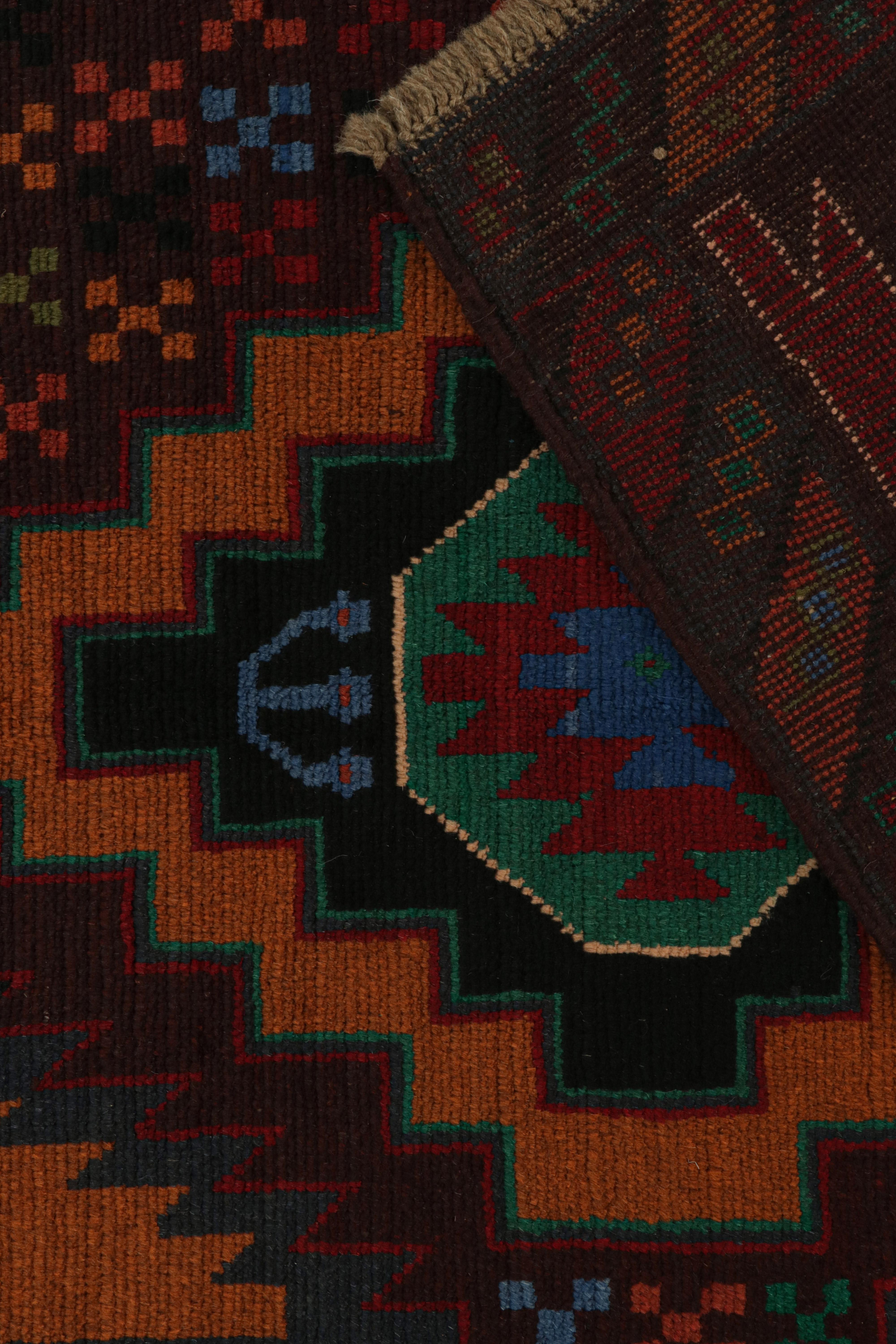 Rug & Kilim's Baluch Stammesteppich mit bunten geometrischen Mustern (Wolle) im Angebot