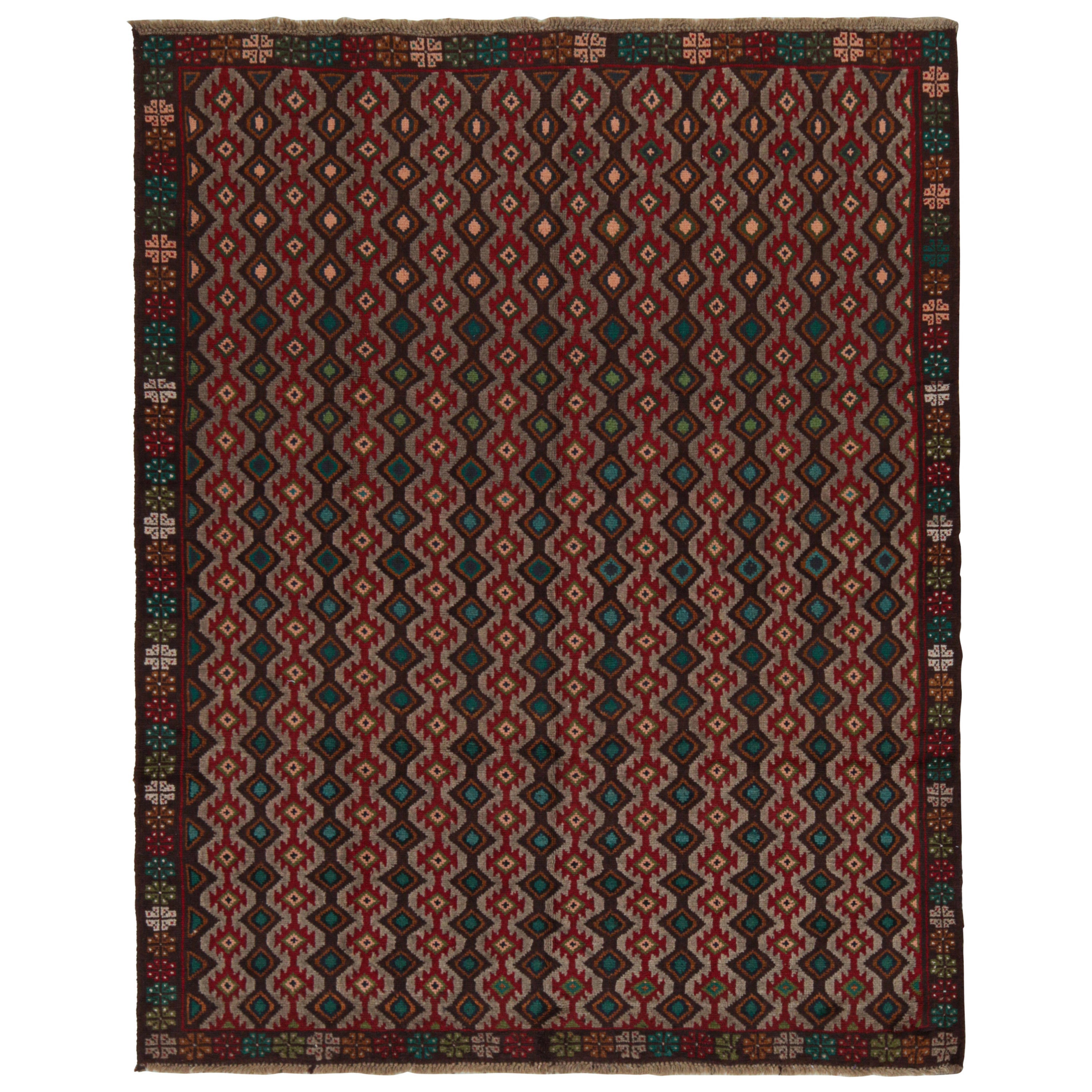 Tapis tribal Baluch à motifs géométriques colorés de Rug
Kilim