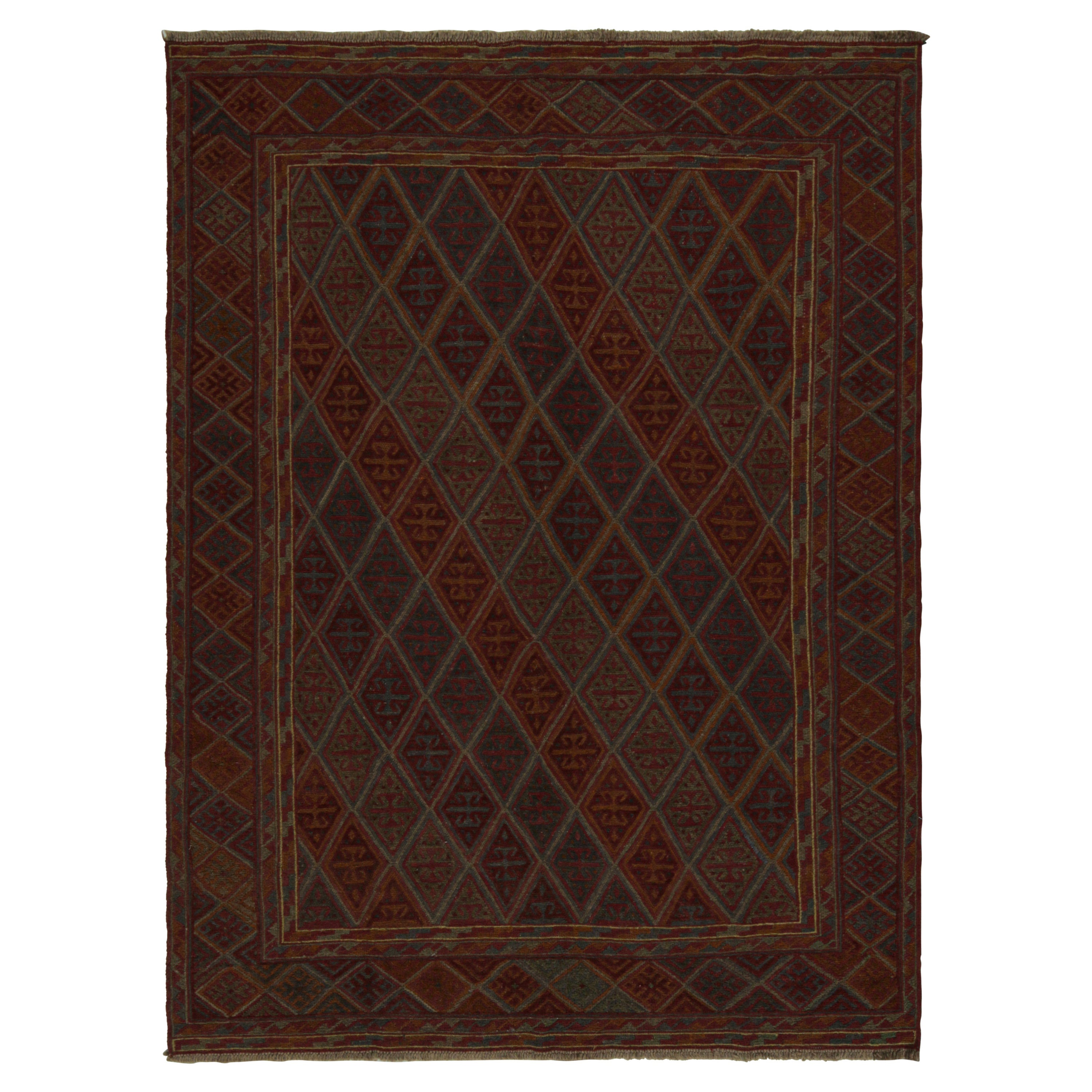 Alfombra tribal Baluch de Rug
Kilim con coloridos motivos geométricos