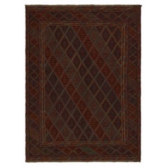 Alfombra tribal Baluch de Rug
Kilim con coloridos motivos geométricos