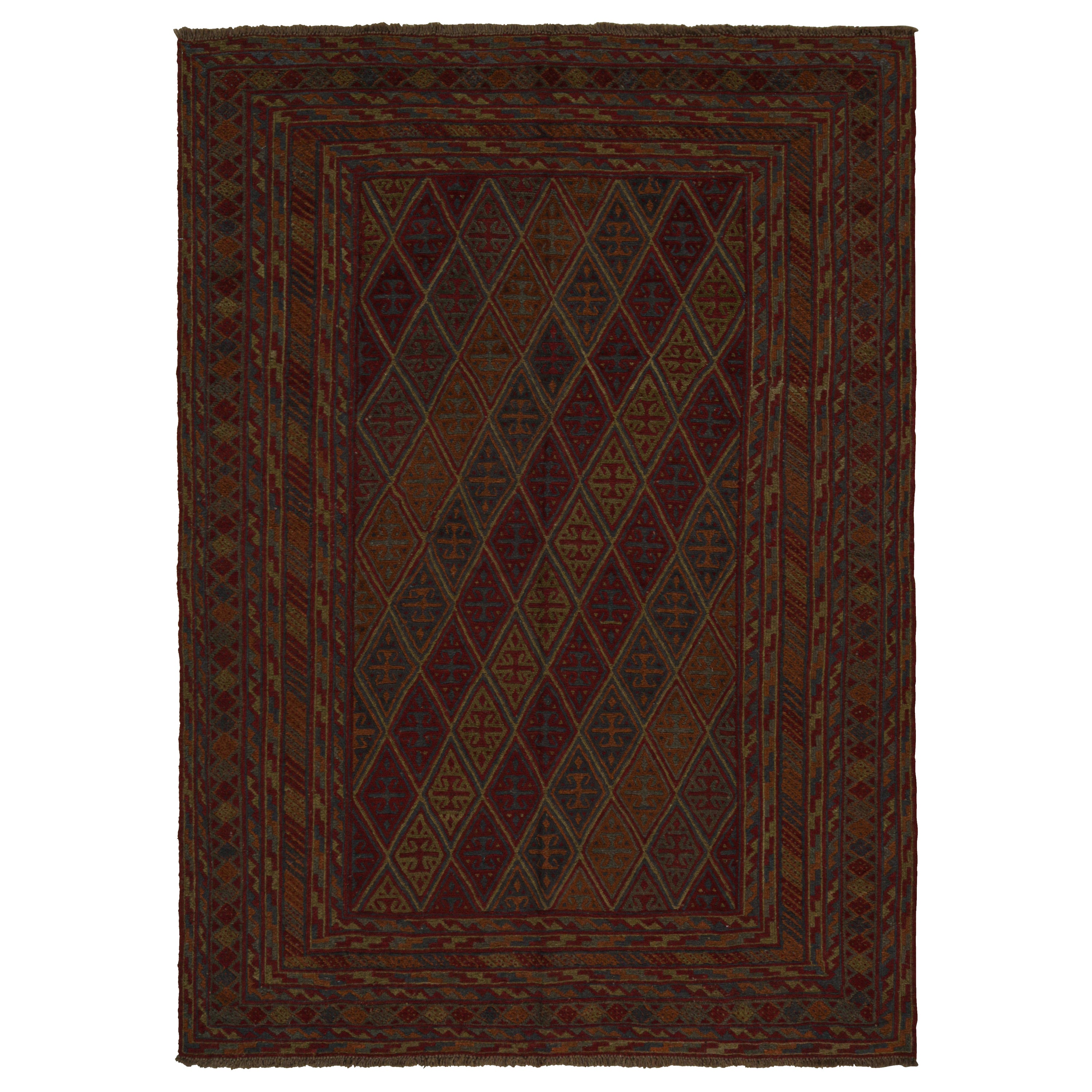 Alfombra tribal Baluch de Rug
Kilim con coloridos motivos geométricos