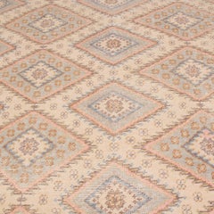 Rug & Kilim’s Beige and Blue Wool Rug from the Homage Collection