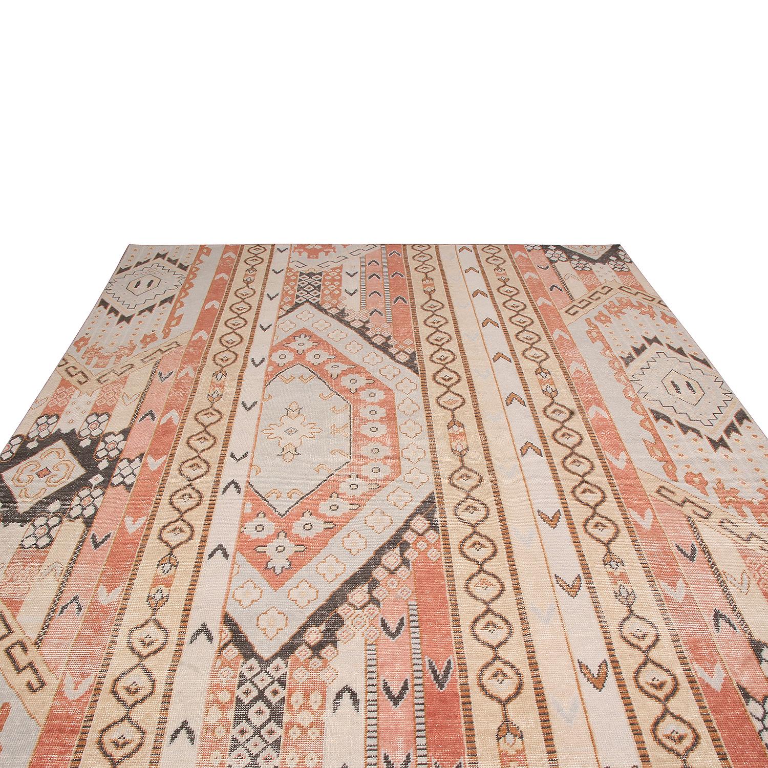Hand knotted in high-quality wool originating from India, this geometric-floral rug is the latest addition to Rug & Kilim’s Homage Collection, enjoying a finer take on distressed shabby chic aesthetic with fewer knots per square inch. One of the