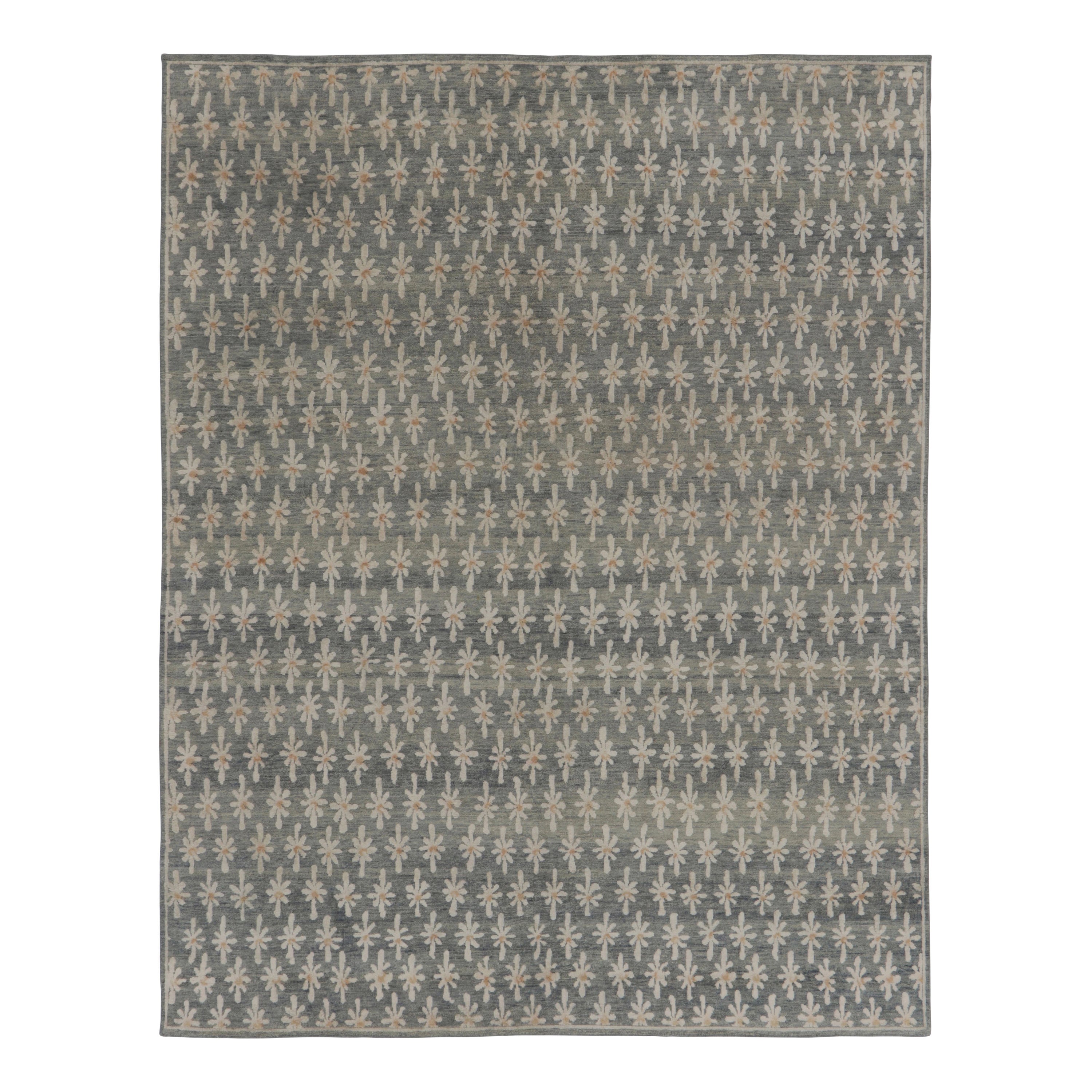 Diseño de alfombra con estampado de bloques de Rug
Kilim en marrón con motivos florales en gris