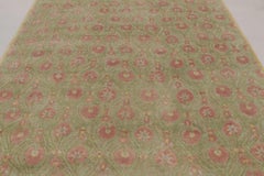 Rug & Kilim’s Block Print Rug in Green with Rose Pink Floral Patterns