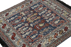 Rug & Kilim’s Blue Tribal Style Square Rug with Primitivist Geometric Patterns