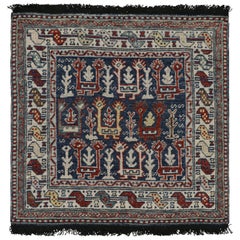 Rug & Kilim’s Blue Tribal Style Square Rug with Primitivist Geometric Patterns