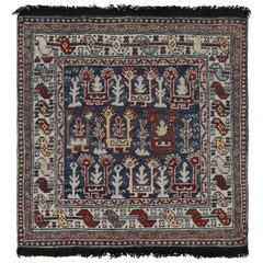 Rug & Kilim’s Blue Tribal Style Square Rug with Primitivist Geometric Patterns