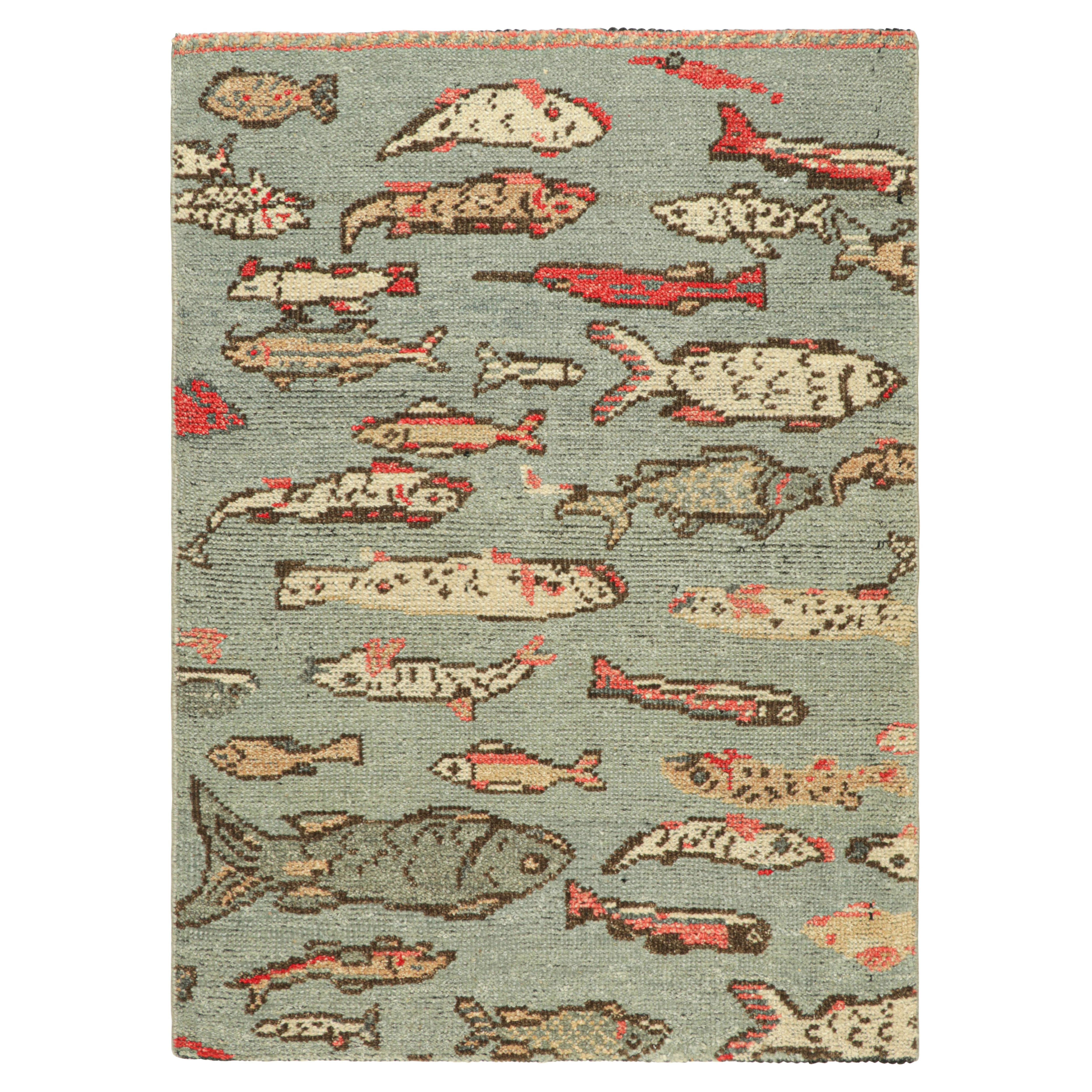 Rug & Kilim's Burano Custom Rug Sample In Blue with Colorful Fish Pictorial (échantillon de tapis sur mesure de Burano en bleu avec des poissons colorés)