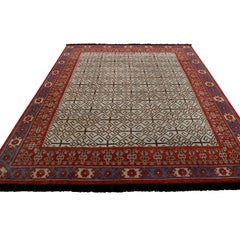 Rug & Kilim’s Burano Persian Style Geometric Green and Red Wool Custom Rug
