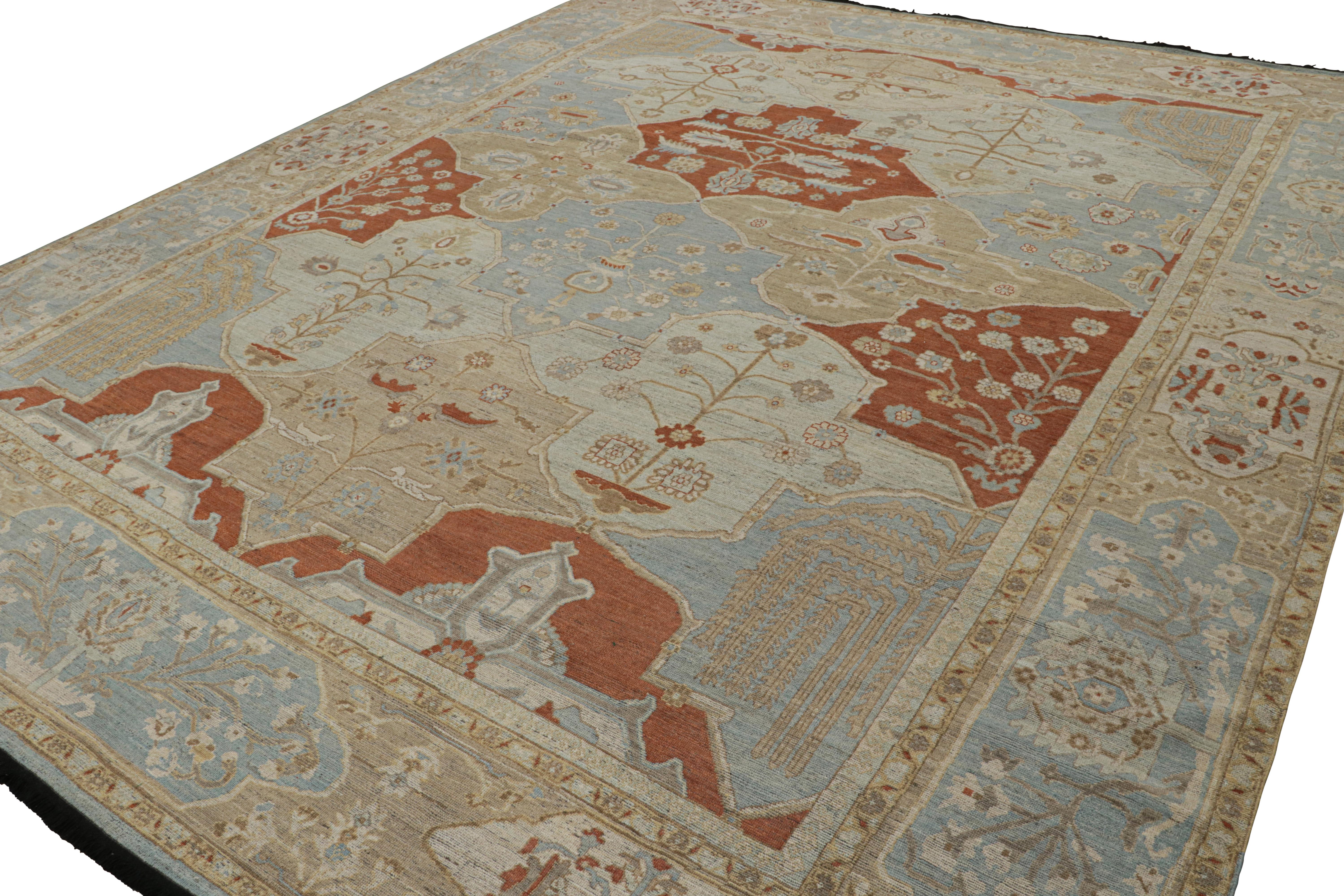 Hand knotted in wool, this 13x16 Burano rug in beige, red and blue tones with floral patterns and cartouches almost like those of Yazd rugs and similar rarities, is inspired by antique Persian rugs. 

On the Design: 

Inspired by antique Persian