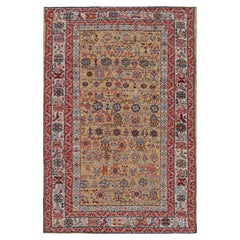 Rug & Kilim è un tappeto caucasico in stile Kuba, color oro e con motivi geometrici e floreali.