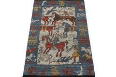 Rug & Kilim’s Caucasian Tribal Rug in Beige with Horseback Warrior Pictorials