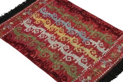 Rug & Kilim’s Caucasian Tribal Rug in Red with Vine Scroll Pictorials