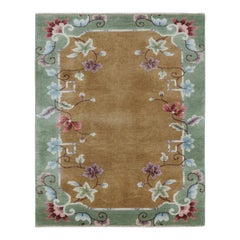 Rug & Kilim è un tappeto cinese in stile Art Deco di colore marrone con motivi floreali colorati