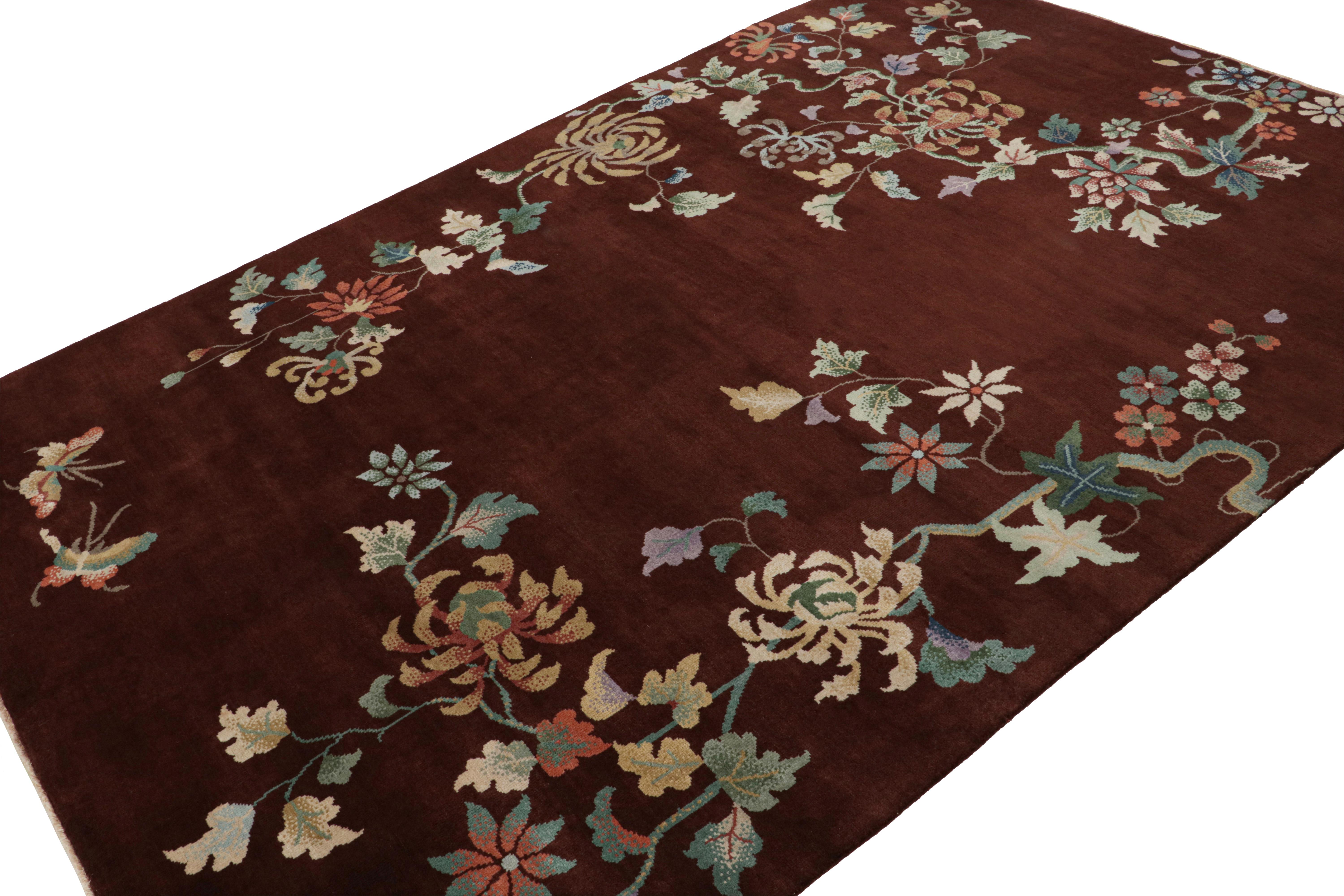 Hand knotted in wool, a 6x9 Chinese art deco style rug inspired by rare period pieces of the 1920s Nichols style. 

On the Design: 

The design boasts rich brown and burgundy undertones with more vibrant floral patterns and butterfly pictorials in a