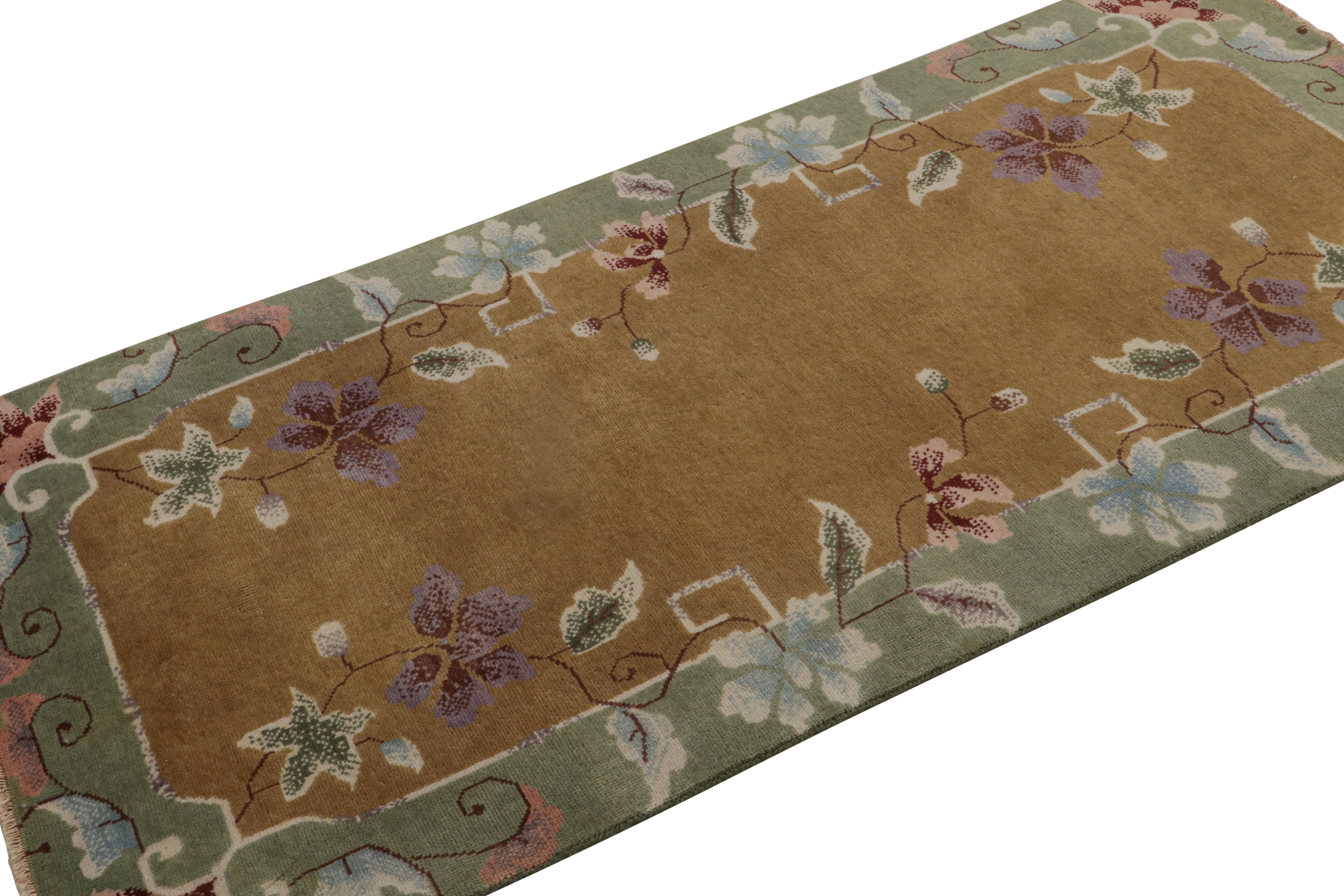 Hand-knotted in wool and cotton, this 3x6 scatter rug by Rug & Kilim is a new addition to their Chinese Art Deco rug line.

On the Design: 

The rug enjoys a golden-brown open field with green borders marrying floral patterns in light blue and pink