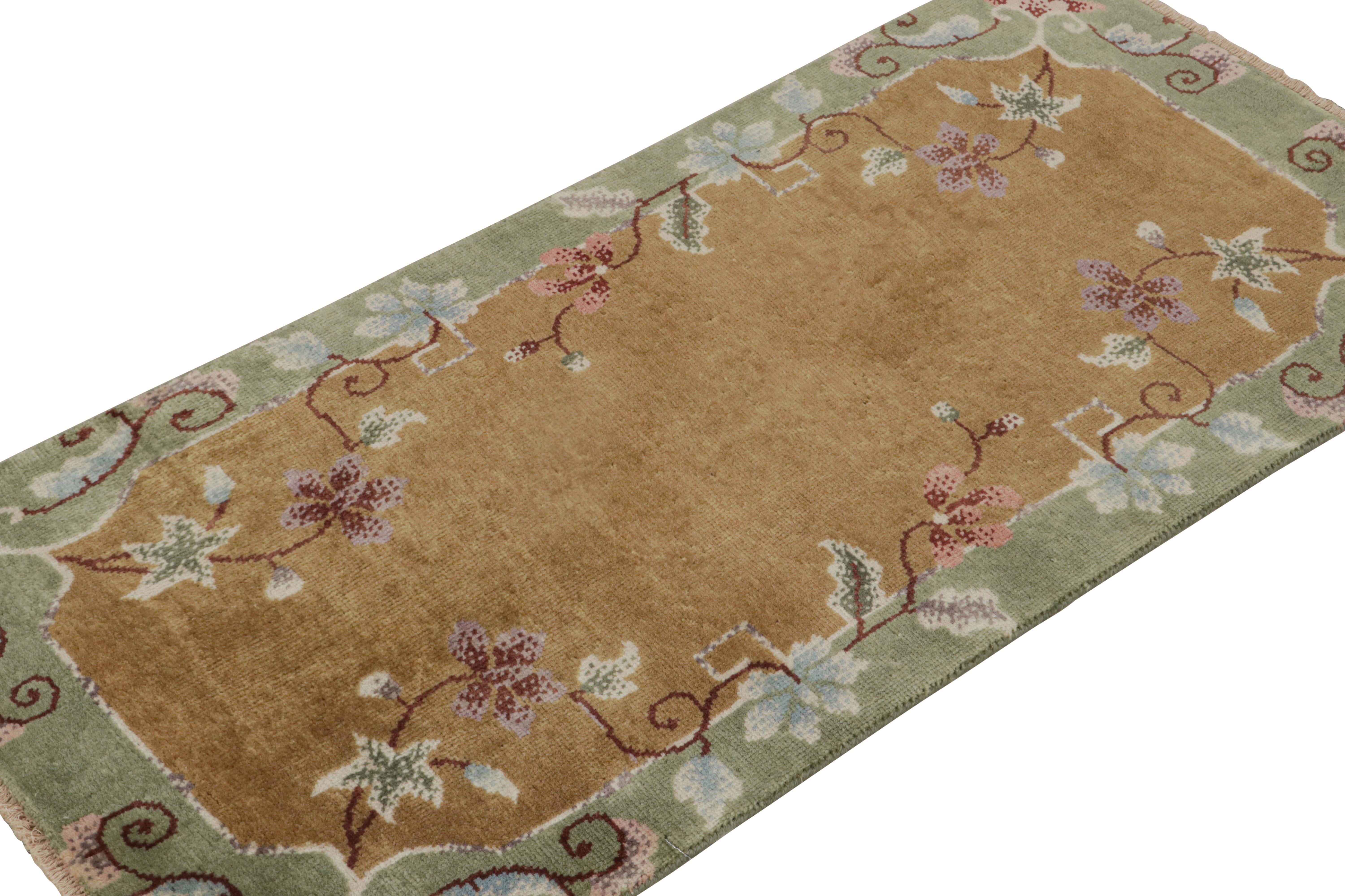 Hand-knotted in wool, this 2x4 scatter rug by Rug & Kilim is a new addition to their Chinese Art Deco rug line.

On the Design: 

The rug enjoys a golden-brown open field with green borders marrying floral patterns in light blue and pink tones.