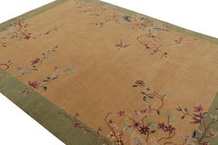 Rug & Kilim’s Chinese Art Deco style rug, with Floral Patterns and Pictorials