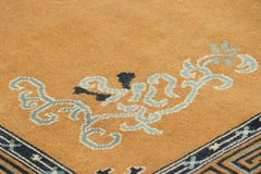 Rug & Kilim’s Chinese Art Deco Style Square Rug in Amber Gold with Floral Patter