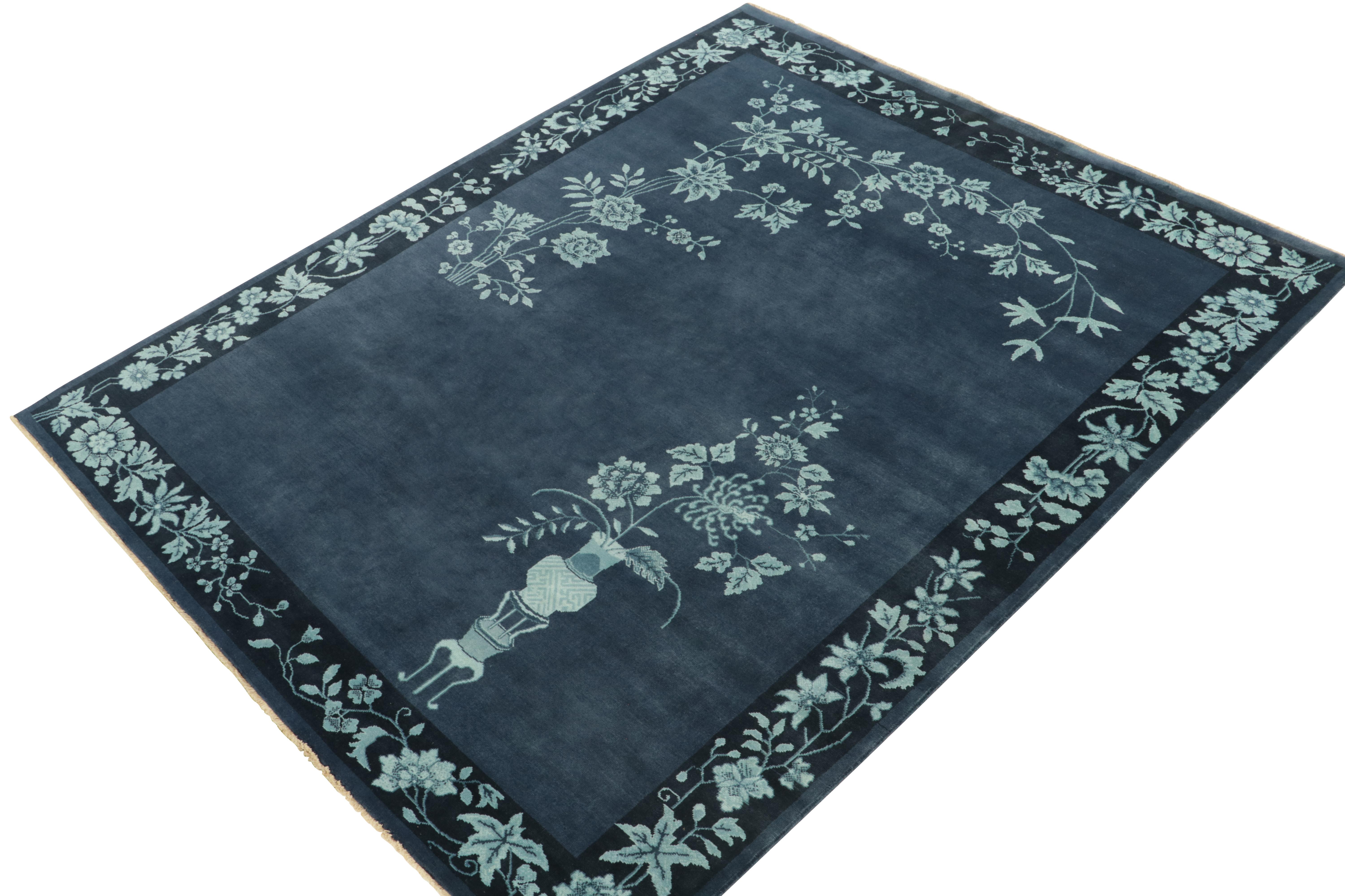 Hand-knotted in luscious wool, an 8x10 Art Deco rug inspired by Chinese sensibilities of the 1920s. 

On the Design: Deep and bright tones of blue marry the sheen of wool for an alluring luster in a healthy pile throughout the pattern, decorating